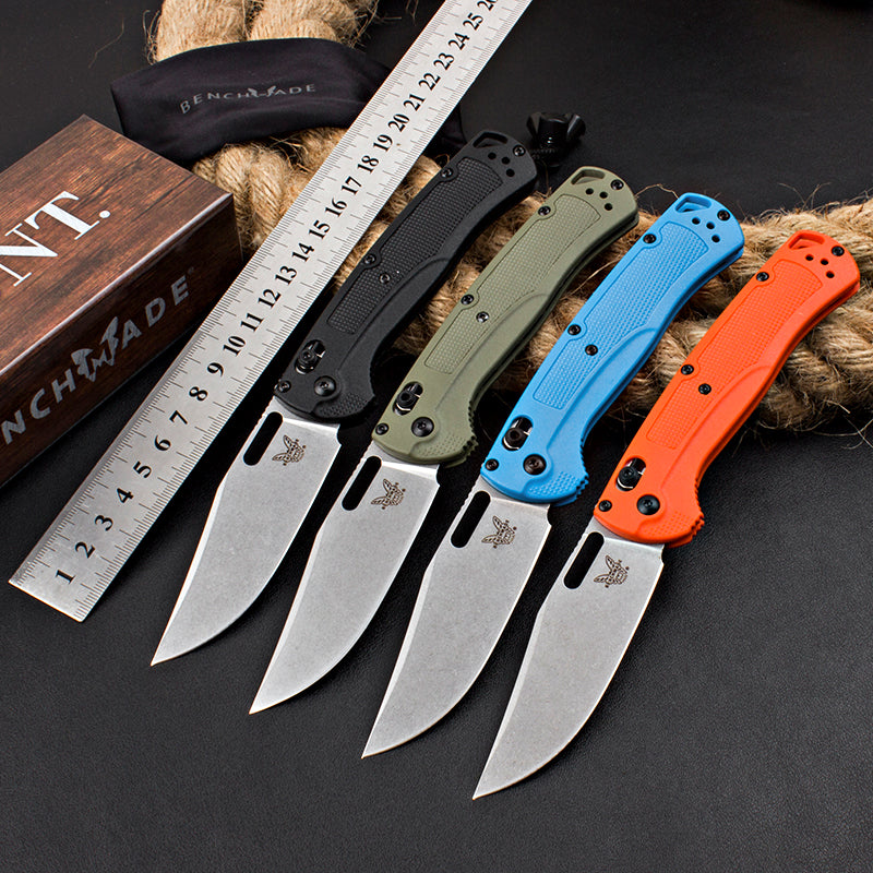 Axis-lock folding knife with fiberglass handle