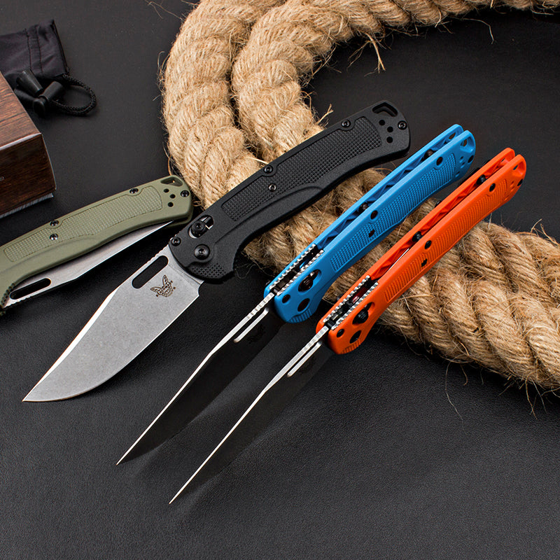 Axis-lock folding knife with fiberglass handle