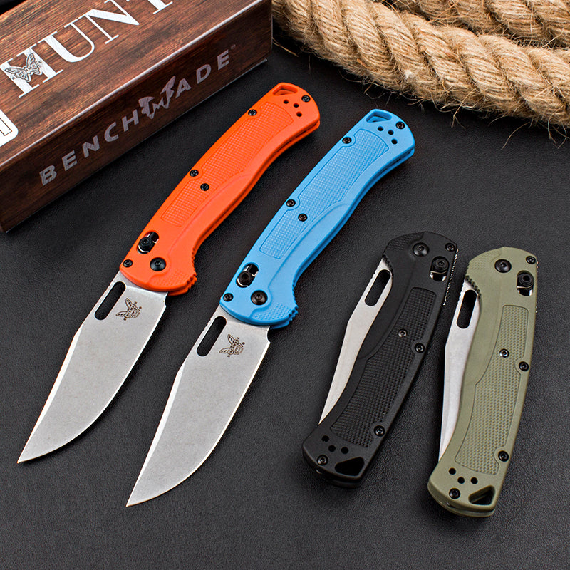 Axis-lock folding knife with fiberglass handle