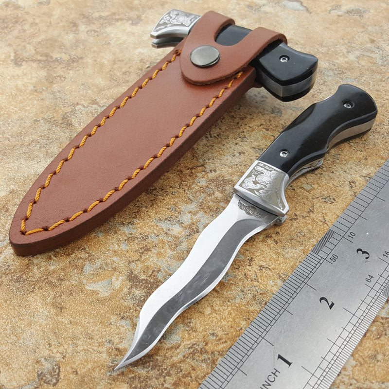 hand stiletto (ox horn handle with serpentine blade)
